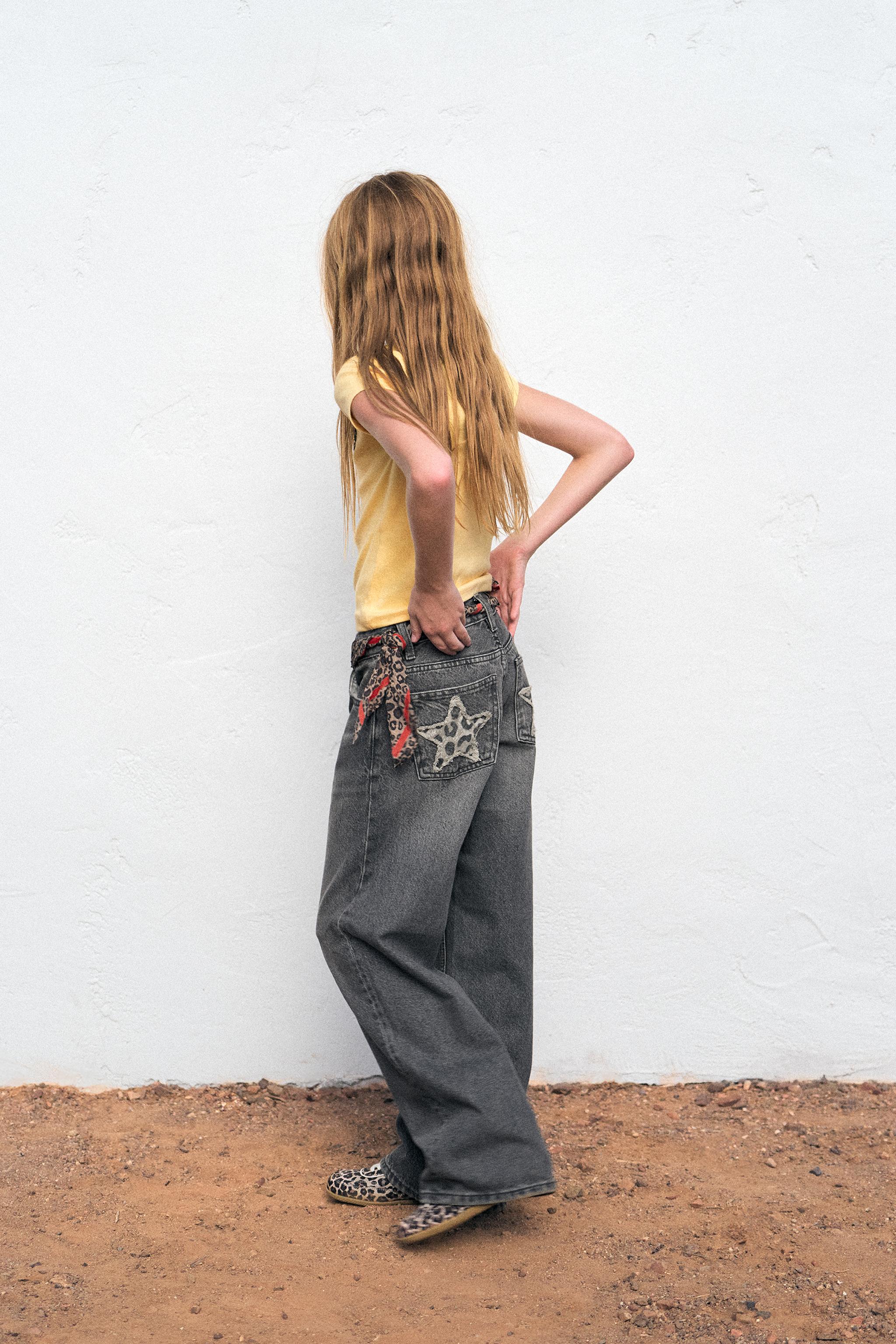 ANIMAL PRINT STAR WIDE LEG JEANS